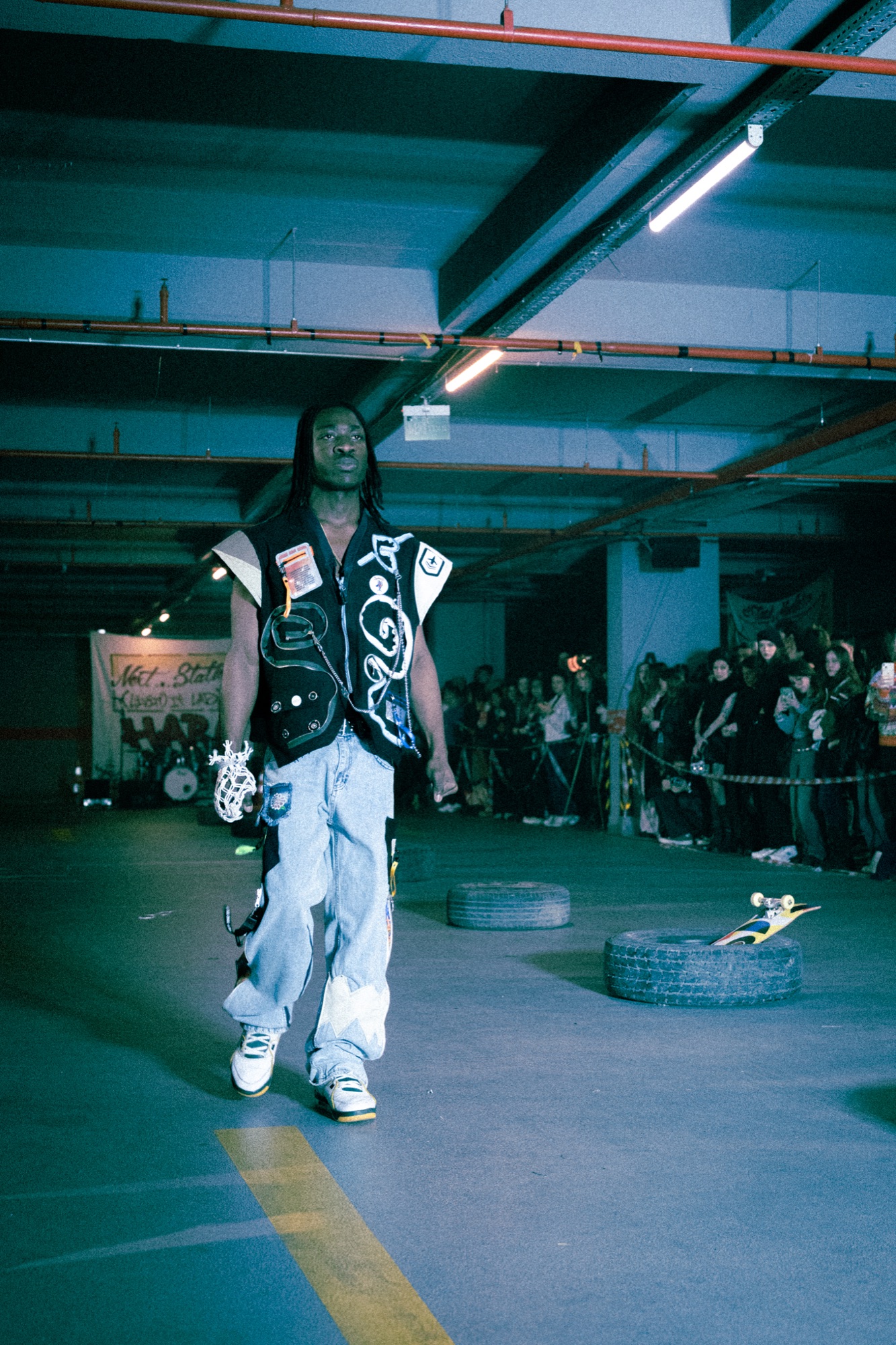 Model on underground runway, industrial setting